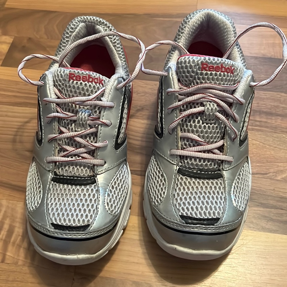 Pink and gray Reebok shoes. Size 8 1/2. Gently worn. 2 pair @ $30ea